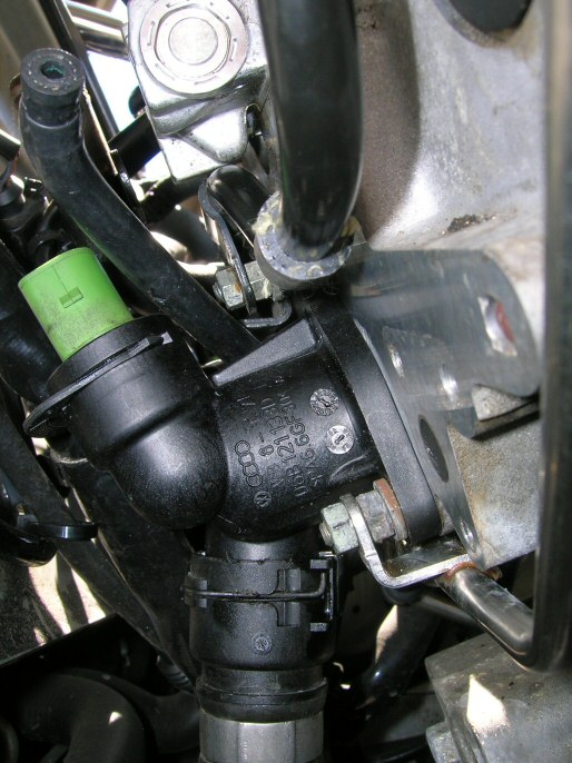 the new coolant flange, studs